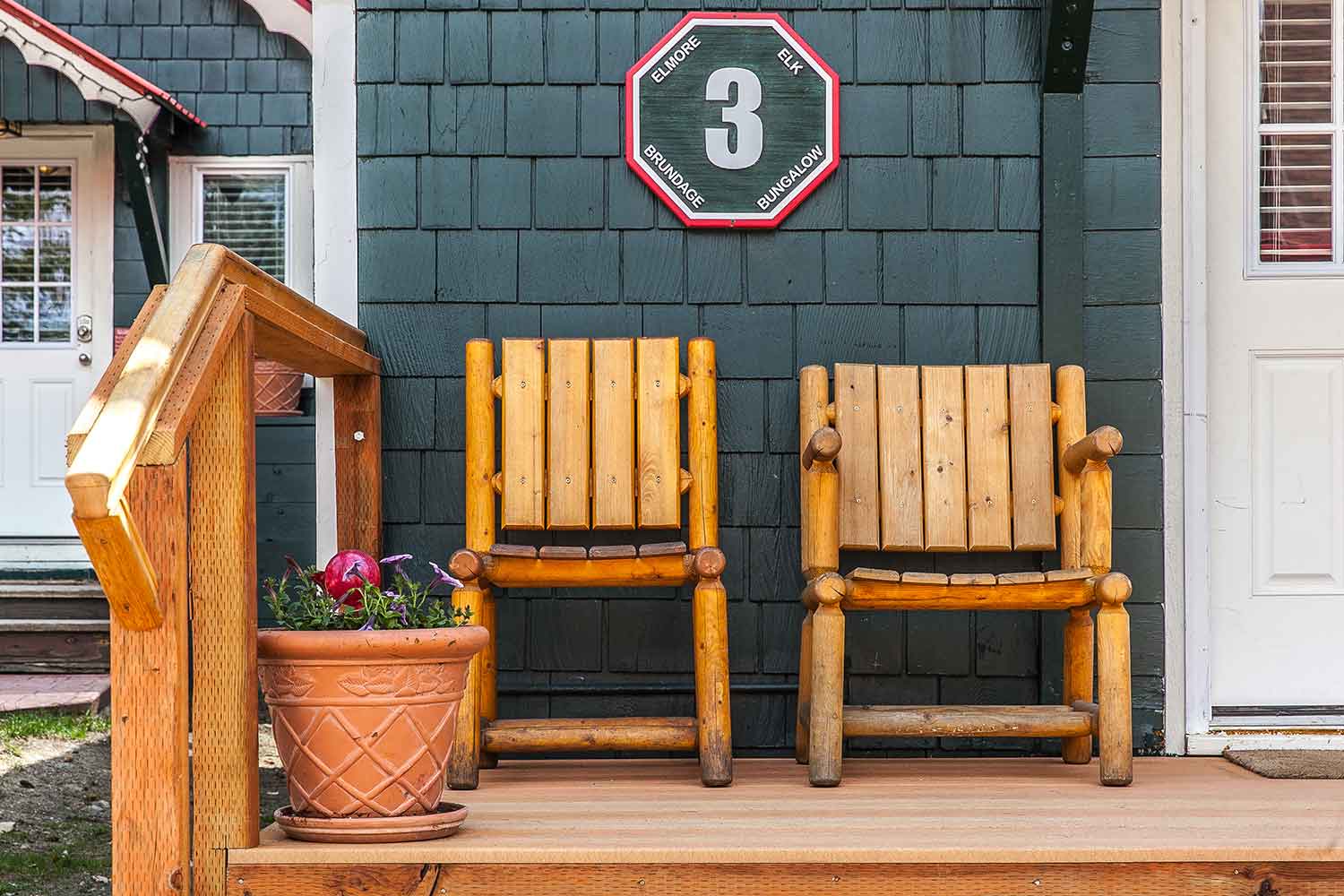 King bedroom with reclaimed wood wall
